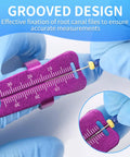 Aluminum Endodontic Measuring Ring Pro Grade Root Canal Ruler For Accurate 0 To 30mm Measurements, Lightweight Handy Dental Tool With Smooth Surface Easy To Use Durable Alloy Instrument For Precision. Grooved purple root canal file ruler in gloved hand, 0-30mm scale