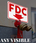 Heavy Duty FDC Sign With Down Arrow 18 X 12 Inch 0 040 Aluminum mounted near fire hydrant for night emergencies.