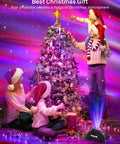 Family decorating Christmas tree with Northern Lights Aurora Projector With Star Projector And Music Speaker For Home Decor.