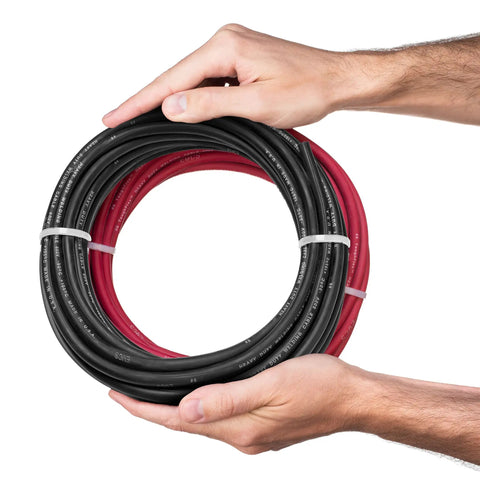 6 Gauge Premium Extra Flexible Welding Cable 600 Volt Combo Pack Black And Red, 25 Feet Each, held in hands, Sunlight Resistant