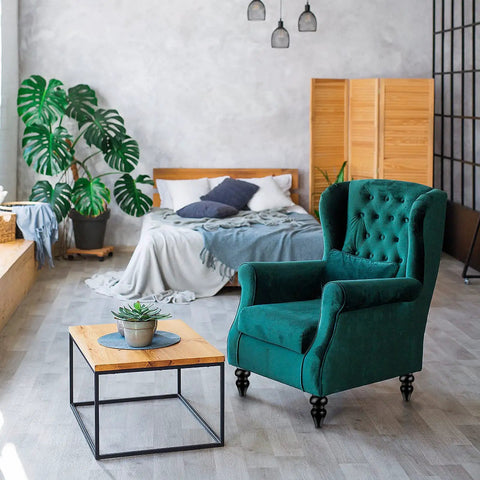 Living room with 6 Inch Black Wood Furniture Legs Set Of 4 For Sofas, Chairs, Coffee Tables And Beds, elegant green armchair, and wood coffee table.