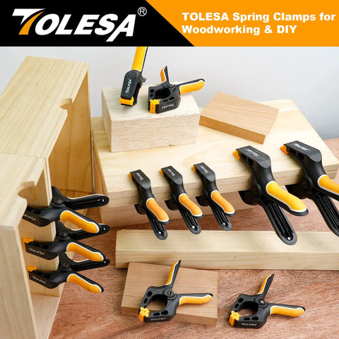 Heavy Duty 4 Inch Spring Clamps Set Of 8 With 30 Lbs Clamping Force on wood blocks for woodworking and DIY projects