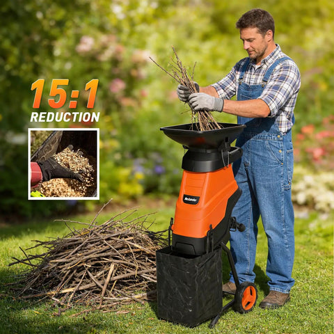 Man using Powerful 15 Amp Electric Wood Chipper Shredder With 1.75 Inch Cutting Capacity For Branches And Twigs