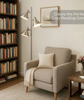 Brushed Nickel Floor Lamp With Three Adjustable Reading Heads in cozy reading corner with armchair and bookshelf