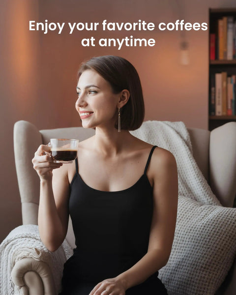 Woman enjoying coffee in a cozy chair, highlighting the Top Shelf Automatic Espresso Machine With Built In Grinder And Touch Panel For Fire Lattes And Creamy Cappuccinos Fuel Daily Sips At Twenty Bar Across Fifteen Settings With Effortless Self Cleaning.