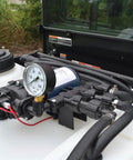 25 Gallon Boomless ATV Sprayer With Adjustable Spray Nozzle And Deluxe Pistol Grip showing close-up of pump and pressure gauge