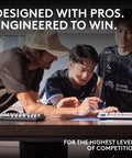 Three gamers collaborating over a desk with a Compact Sixty Percent Wireless Gaming Keyboard Featuring Tactile Optical Switches And Sleek Magenta Build.