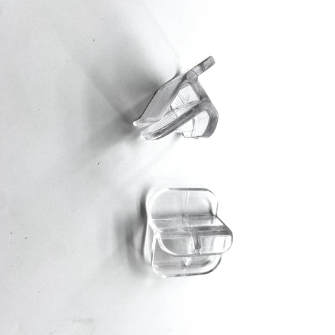 Two clear heavy duty clips from the 10 Pack Rimless Aquarium Clips For 3 To 5 Mm Glass Top Mount Lid Support.