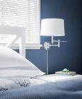 Theta Wall Swing Arm Lamp In Brushed Steel Finish by bedside with adjustable arms, drum shade, modern decor