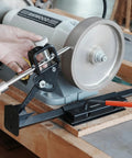 BG-GRIND4 grinding jig system installed on bench grinder; black steel bracket for chisels