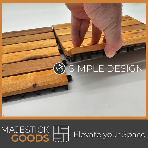 Interlocking Acacia Deck Tiles For Patio And Walkways No Fuss Tool Free Install With Raised Base Drainage Long Slat Outdoor Flooring 12 By 12 Inch Tiles 8 Count being installed by hand close-up.