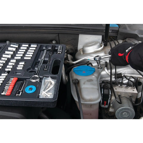 Mechanic using 85 Piece SAE And Metric Socket Set With One Quarter Inch, Three Eighths Inch And One Half Inch Drives on car engine
