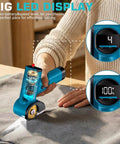 Bluebow Cordless Electric Scissors With Rechargeable Battery For Cutting Cardboard Box 1/4 Inch Thick Heavy Duty Power Tool showing LED display while cutting fabric.