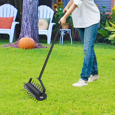Person using 62 Inch Rolling Lawn Aerator With 17 Inch Roller Heavy Duty Manual Turf Aerator For Quick Soil Breakup on a lawn