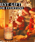 Family enjoying Pink Himalayan Salt Lamp With Dimmer Switch In A Tall Round Metal Basket, 8 To 10 Lbs by fireplace