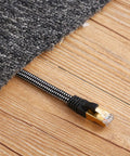 10ft Cat 8 Ethernet Cable High Speed Network Cable With RJ45 Connectors For Printer Router And Gaming Console Ultra Fast 2000MHz Bandwidth Up To 40Gbps Braided Nylon Beefy Durability And Dirt Resistant Design under rug