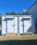 Custom Cold Room Build Top Shelf Heavy Duty Industrial Walk In Freezer Blast Freezing exterior with dual doors and ramp.