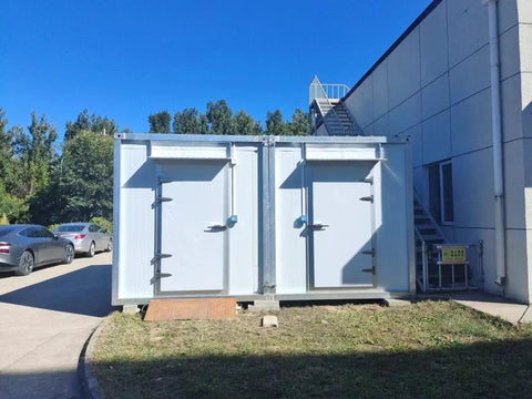 Custom Cold Room Build Top Shelf Heavy Duty Industrial Walk In Freezer Blast Freezing exterior with dual doors and ramp.