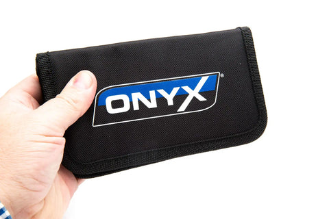 Hand holding Onyx pouch for Pro Grade Do It All RC Tool Set For Air And Surface Startups with Aluminum Handle and Zipper Case.