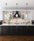 9.13 Inch Wide Pendant Light With Glass Shade In Blackened Bronze And White Milk Glass Diffuser in a modern kitchen