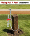 Heavy Duty Fence Post Removal Tool With 7100 Lb Pull Capacity, Galvanized Cable And Chain, Works With Jack Or Lever For 4x4 Fence Posts And Even Broken Or Rotted Posts, Easy Extraction No Digging Required shown removing a wood fence post