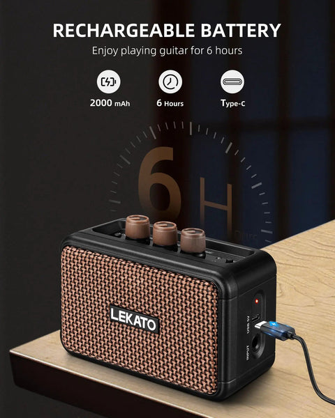 Portable 5W Mini Guitar Amplifier With Dual Speakers, Rechargeable Bluetooth Practice Amp charging on desk, brown finish