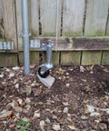 Two Inch PU Gate Wheel 2 Pack Heavy Duty Spring Loaded Gate Caster installed on wooden fence gate