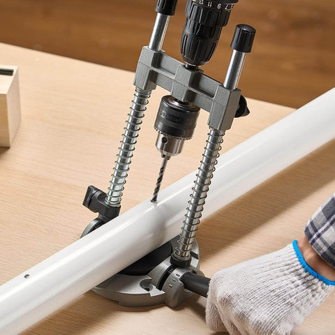 Pro Grade Multi Angle Drill Guide Jig For Woodworking Portable Precision Drilling Guide With 45 Degree 60 Degree 75 Degree 90 Degree Settings Aluminum Alloy Build Large Handle Mounting Holes For Accurate Angled Or Straight Holes drilling into a wooden surface.