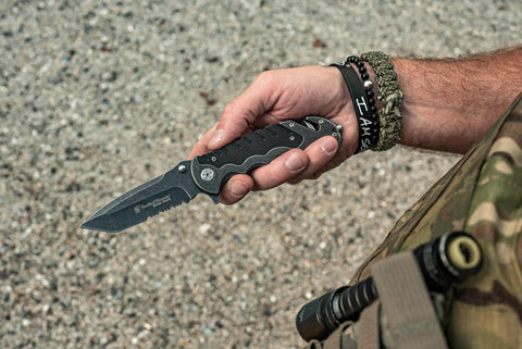 Person holding Border Guard SWBG10S Folding Knife With 3.1 Inch Serrated Tanto Blade 7Cr17MoV High Carbon Stainless Steel Aluminum Handle