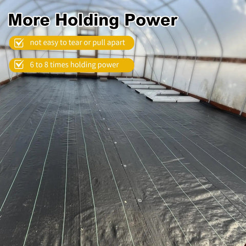 Heavy Duty Six Inch 8 Gauge Galvanized Landscape Staples securing black weed barrier fabric in greenhouse