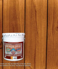 Bucket of Exterior Wood Stain And Sealer In One For Decks Fences Pergolas And Siding Semi Transparent Oil Based Finish No Fuss Goof Proof Application 5 Gallon Natural Cedar against wood backdrop