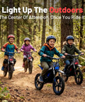 Kids riding Kids Electric Dirt Bike 36V 350W Motor With Alloy Wheels And Fourteen Inch Pneumatic Tires in a forest setting