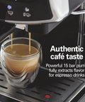Slide And Lock Espresso Machine With Built In Milk Frother Steam Wand 15 Bar Pump Compact Countertop Coffee Maker smooth espresso pouring into a glass.
