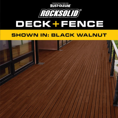 Hardcore Deck And Fence Stain With Gnarly UV Protection Black Walnut Oil Base applied to a wooden deck surface.