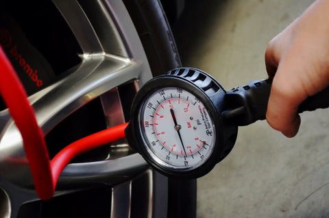 Using 3081 Dial Tire Inflator With 3 In 1 Inflate Deflate And Pressure Gauge on car tire with pro-grade aluminum die-cast body.