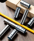 Built Tough As Nails Eight Piece 6 Inch Adjustable Table Leg Extensions Galvanized Steel pipes on wooden surface.