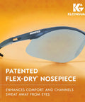 Close-up of V30 Nemesis Safety Glasses with copper blue shield lenses and patented Flex-Dry nosepiece on lightweight black frame