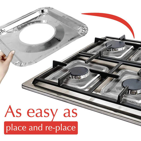 Hand placing 50 Pack Disposable Gas Burner Liners For No Scrub Cleanup And Easy Stove Upkeep Aluminum Foil Square Covers on stove