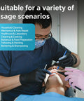 Front view of dentist wearing black nitrile disposable gloves during a dental procedure on a patient.