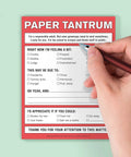 Person writing on Paper Tantrum Nifty Note Pad Classic Edition with 50 Sheets, featuring passive aggressive notes, 4x5.25 inches.