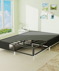 Heavy Duty King Box Spring With Thick Fabric Cover And Reinforced Steel Frame Low Profile Bed Base in a bright bedroom.