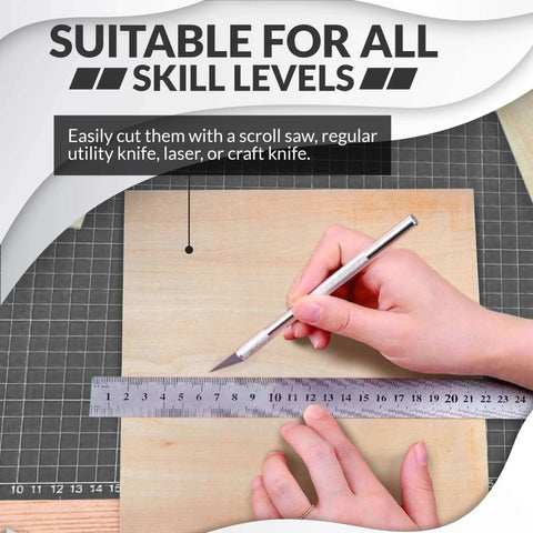 Front view of Basswood craft sheets, 12 x 12 in, 1/16 in thick, 10-pack, with ruler on cutting mat.