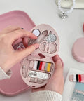 Compact Travel Sewing Kit Two Pack Featuring Adorable Heart Shaped Cases Pink And Blue with sewing essentials open.