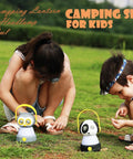 Children playing outdoors with 2-In-1 Kids Owl Lantern And Headlamp Set, battery powered, pink owl design on grass.