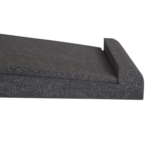 Close-up of a foam speaker cushion, part of a "Pair Of Small Studio Monitor Isolation Pads With Removable Angled Inserts For 5 Inch Monitors Foam Speaker Cushions To Elevate Desk Acoustics Cut Vibration And Deliver Clearer Home Studio Sound."