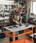 Rugged 36 Inch By 24 Inch Welding Table With 800 Pound Capacity Portable Welding Workbench On Wheels in garage workshop