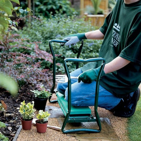 Person using Foldable Garden Kneeler Seat With Tool Bag Dual Function Kneeling Pad And Gardening Stool in a garden