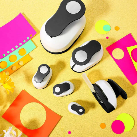 Six Piece Circle Punch Set with All The Right Sizes 0.3in 0.6in 1in 1.5in 2in 3in and Ten Color Sticker Papers for scrapbooking crafts.