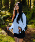 Woman in forest wearing Women's UPF 50+ Long Sleeve Sun Shirt, Lightweight Quick Dry, UV Protection For Hiking And Outdoor Workouts