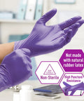 Person wearing Powder Free Nitrile Exam Gloves Iris Blue Medium Box Of 100 For Medical Labs Hospitals And Professional Use